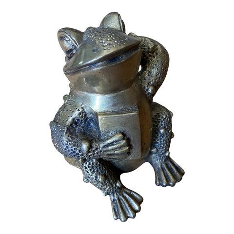 Brass Heavy Frog With Book Figurine: Beautiful Heavy brass frog holding a book with exquisite details on skin. In beautiful condition for its age! DIMENSIONS 3.5ʺW × 3.5ʺD × 5ʺH STYLES American Art Nouveau Co