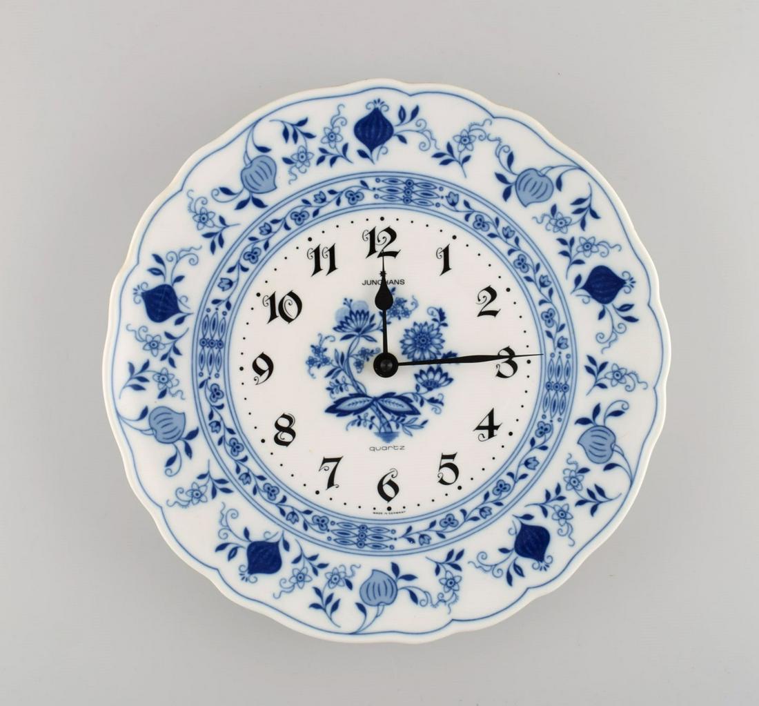 Junghans porcelain wall clock. Meissen Blue Onion style. Germany, 1970s.: Junghans porcelain wall clock. Meissen Blue Onion style. Germany, 1970s. Diameter: 29 cm. Depth: 4.5 cm. In excellent condition. Stamped. Reserve: $119.00 Shipping: Domestic: Shipping rates are determ