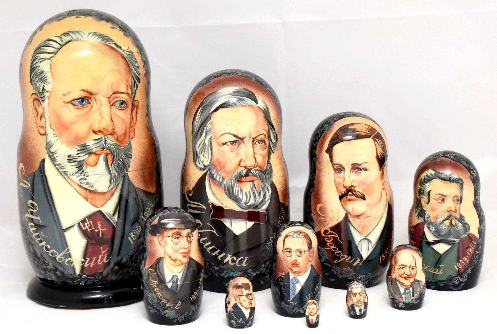 Matreshka: Matreshka. Traditional russian wooden nesting doll. Hand made, hand painted with Russian composers – Tchaikovsky, Glinka, Borodin, Mussorgsky and others. Artist’s signature, 10 pcs. "Dimen