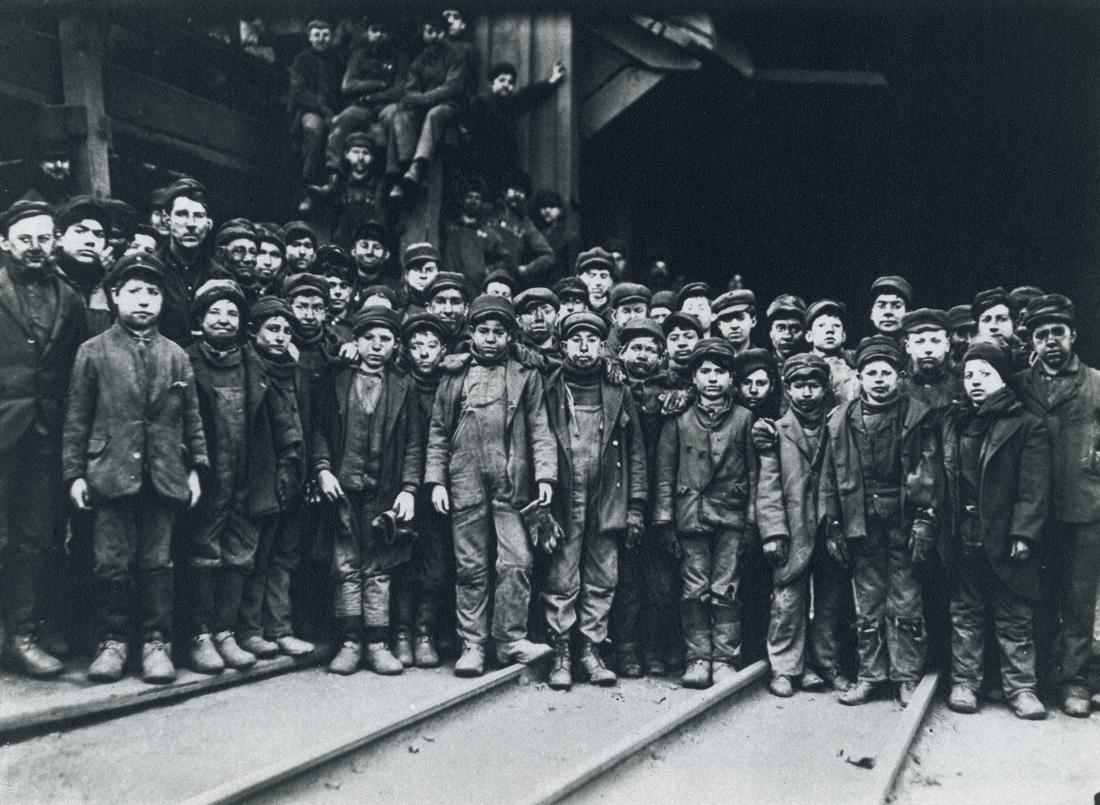 LEWIS HINE - Breaker Boys, Pennsylvania, 1910: Artist: Lewis Hine Title: Breaker Boys, Pennsylvania, 1910 Medium: Photo Litho, 1972, USA Dimensions: 9.05x6.6" Description: Heat Wax Mounted on 8.5x11" Conservation Board Artist Bio: Lewis Wickes Hin