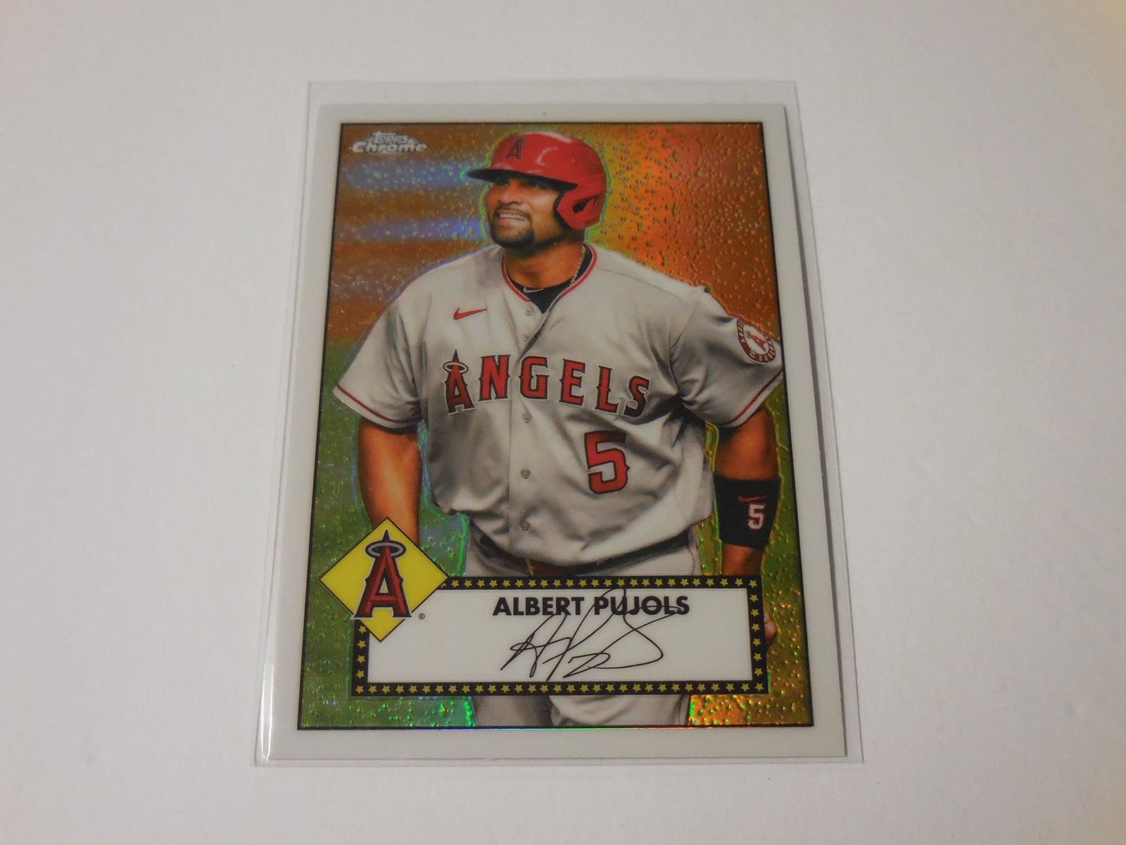 21 TOPPS CHROME ALBERT PUJOLS 1952: Title: 21 TOPPS CHROME ALBERT PUJOLS 1952 Date/Period: Modern Additional Information: 2021 TOPPS CHROME ALBERT PUJOLS 1952 REDUX REFRACTOR THIS IS A MUST HAVE CARD FOR ANY COLLECTOR. PLEASE CHECK COND