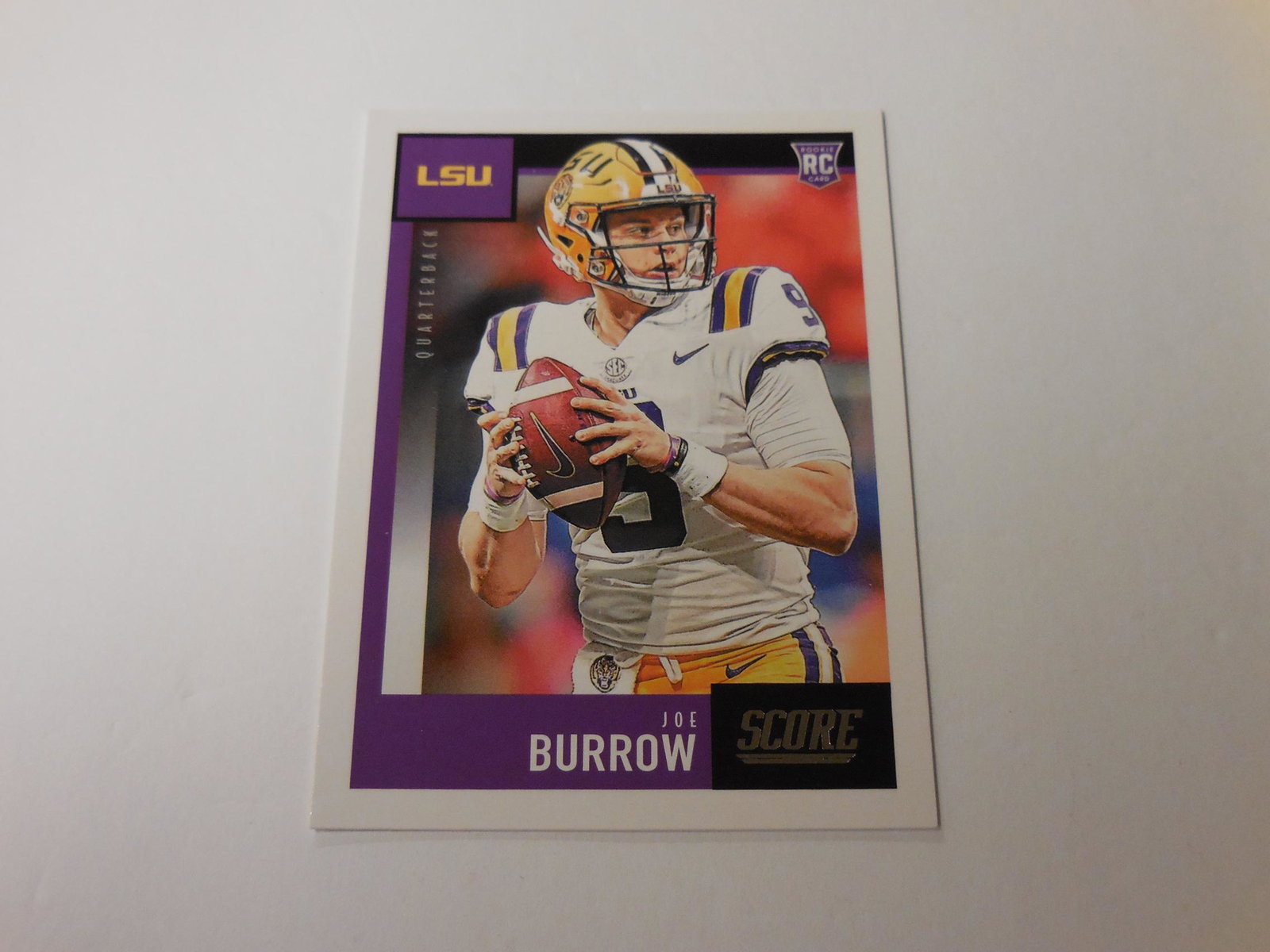 2020 PANINI SCORE JOE BURROW ROOKIE: Title: 2020 PANINI SCORE JOE BURROW ROOKIE Date/Period: Modern Additional Information: 2020 PANINI SCORE JOE BURROW ROOKIE CARD LSU TIGERS THIS IS A MUST HAVE CARD FOR ANY COLLECTOR. PLEASE CHECK COND