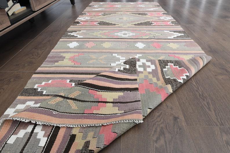 2'7x7'3 ft, PURPLE PINK TURKISH Kitchen Antique Runner Rug: Title: 2'7x7'3 ft, PURPLE PINK TURKISH Kitchen Antique Runner Rug Date/Period: 1960 - 1970 Origin: Turkey Dimension: 82x222=182 CM - 2'7x7'3 ft Materials: Wool and Cotton Provenance: This one-of-a-kin