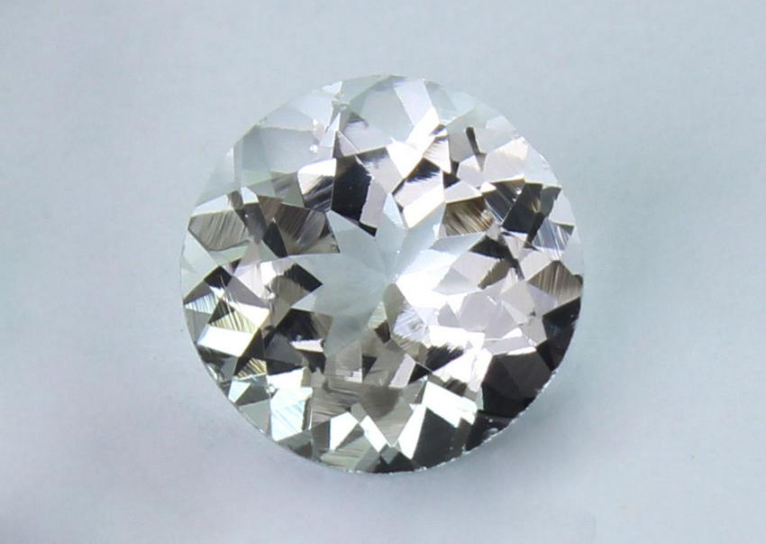 1.12 Cts Natural White Beryl: No Reserve! Title: 1.12 Cts Natural White Beryl Additional Information: Gemstone : Natural White Beryl Origin : Brazil Weight : 1.12 Carats Dimensions : 7x7 mm Shape : Round Cut Color : Colorless Tran