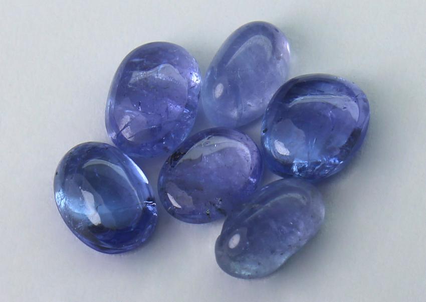 2.94 cts Natural Tanzanite Lot: No Reserve! Title: 2.94 cts Natural Tanzanite Lot Additional Information: Gemstone : Natural Tanzanite Shape and cut : Oval Cabochon Weight : 2.94 carats Measurements : 5.90x4.23x2.56 mm ,5.25x4.18x1.