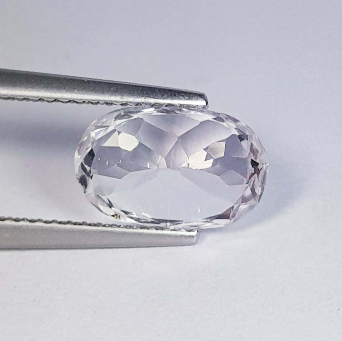 3.30 ctz Natural Pink Kunzite: No Reserve! Title: 3.30 ctz Natural Pink Kunzite Color/Clarity: Pink / VVS Gemstones: Kunzite Carat Weights: 3.3 Size/Dimensions: 11.10 x 7.00 x 6.20 Additional Information: Oval / Afghanistan Shippin