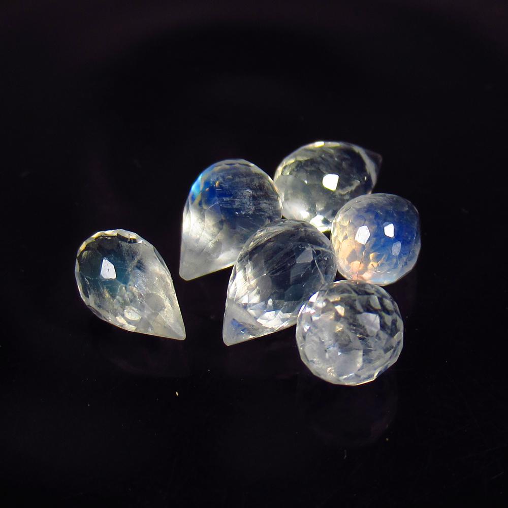 7.92 Ctw Natural 6 Blue Moonstone Pear Drop Beads: No Reserve! Title: 7.92 Ctw Natural 6 Blue Moonstone Pear Drop Beads Stone Clarity: Translucent Gemstones: Natural Moonstone Beads Size/Dimensions: 7.92 Carat Weights: 7.7x5.4 - 8.1x5.7 mm / 6 Pc's Ad