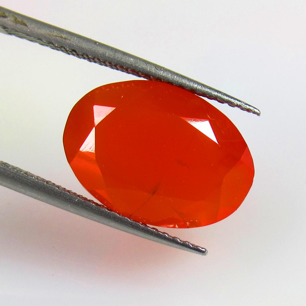 5.60 Ctw Natural Orange Carnelian Oval Cut: No Reserve! Title: 5.60 Ctw Natural Orange Carnelian Oval Cut Stone Clarity: Semi-Transparent Gemstones: Carnelian Size/Dimensions: 5.6 Carat Weights: 14.20 x 10.10 x 6.60 mm Additional Information: E