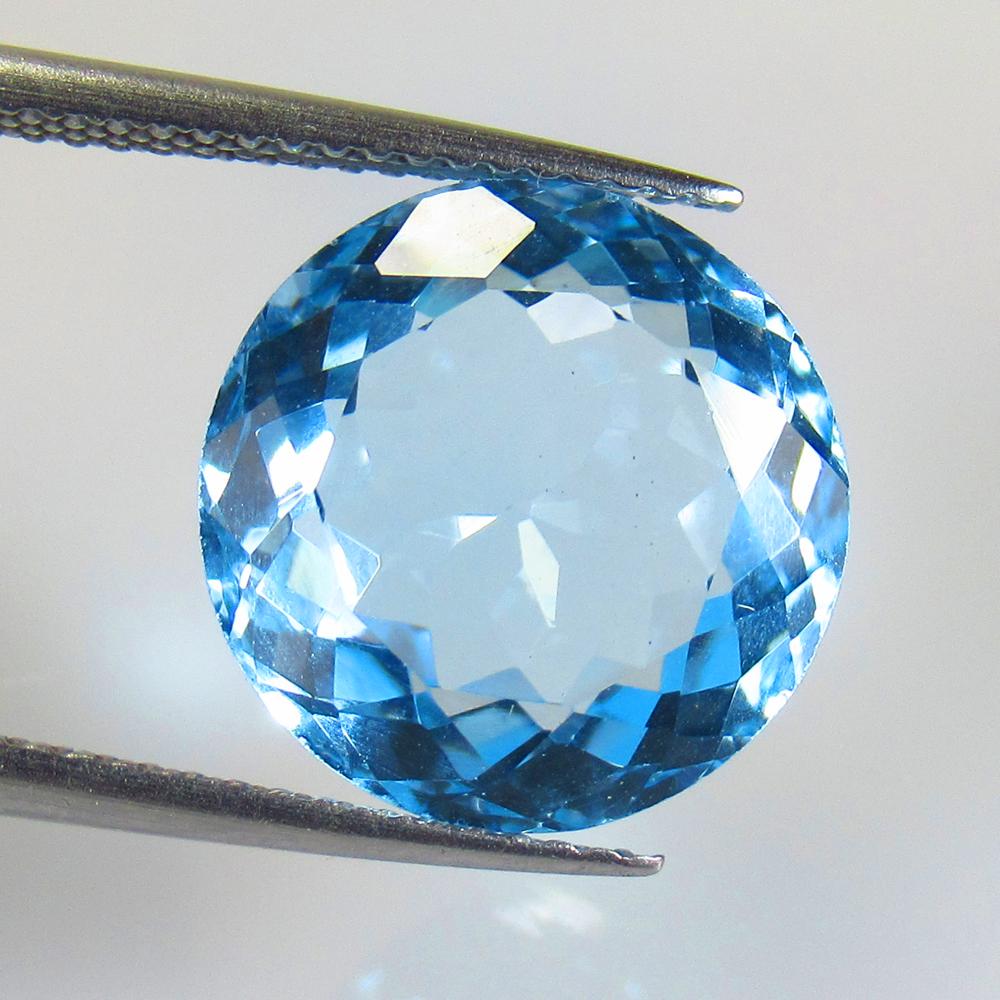 10.14 Ctw Natural Blue Topaz Round Cut: No Reserve! Title: 10.14 Ctw Natural Blue Topaz Round Cut Stone Clarity: VVS Gemstones: Blue Topaz Size/Dimensions: 10.14 Carat Weights: 13.00 x 13.00 x 7.20 mm Additional Information: Excellent Round