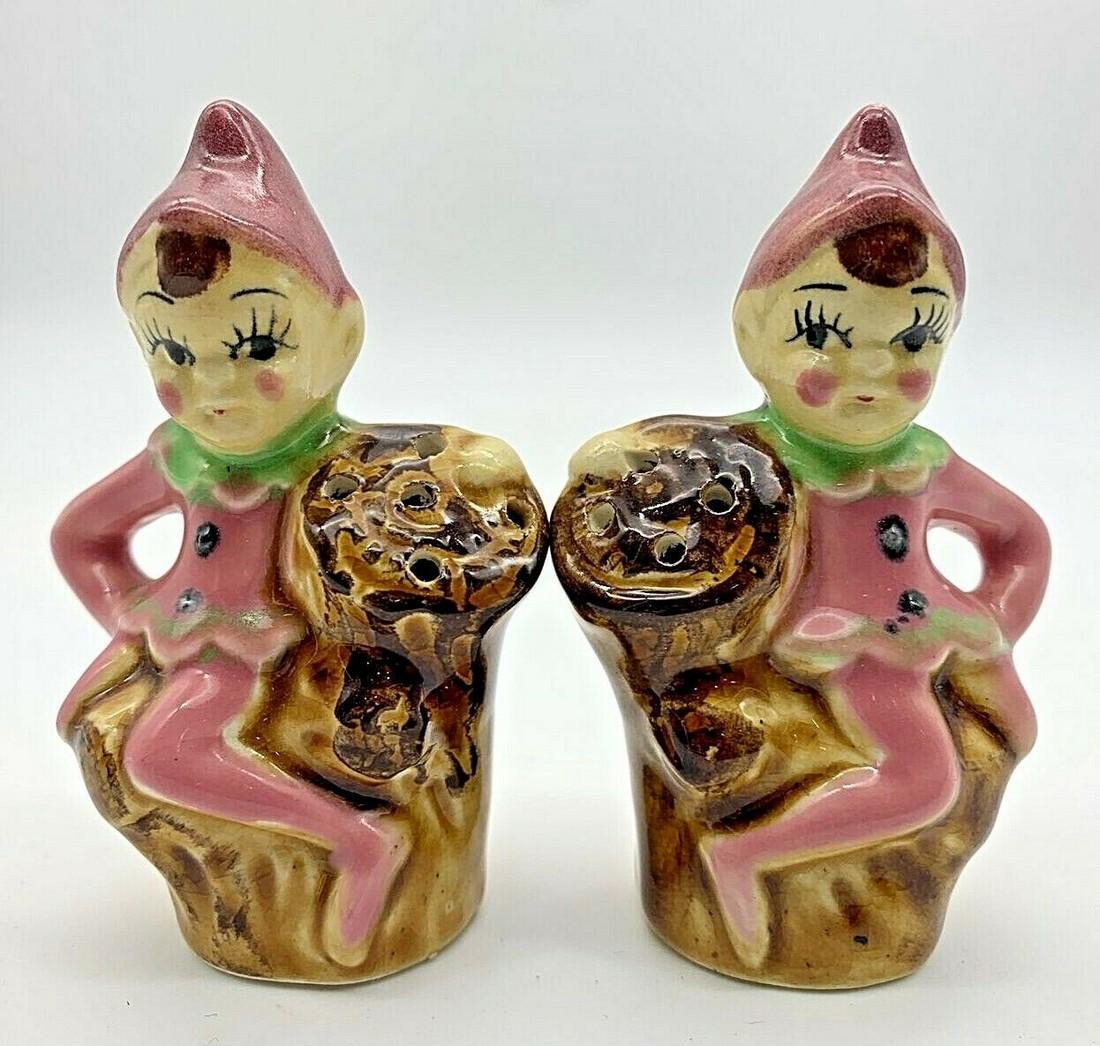 VINTAGE PIXIE WOODLAND ELVES ON LOGS SALT & PEPPER SHAKERS - JAPAN: Title: VINTAGE PIXIE WOODLAND ELVES ON LOGS SALT & PEPPER SHAKERS - JAPAN Date/Period: approx 1950's Dimension: approx 3" tall Materials: ceramic Additional Information: VINTAGE PINK MINT PIXIE WOODLA