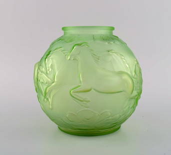 Edvin Ollers (1888-1959) for Elme. Round art deco vase in green frosted pressed art glass with: Edvin Ollers (1888-1959) for Elme. Round art deco vase in green frosted pressed art glass with galloping horses. Swedish design, 1930s. Measures: 19 x 17 cm. In excellent condition. Reserve: $413.00 S