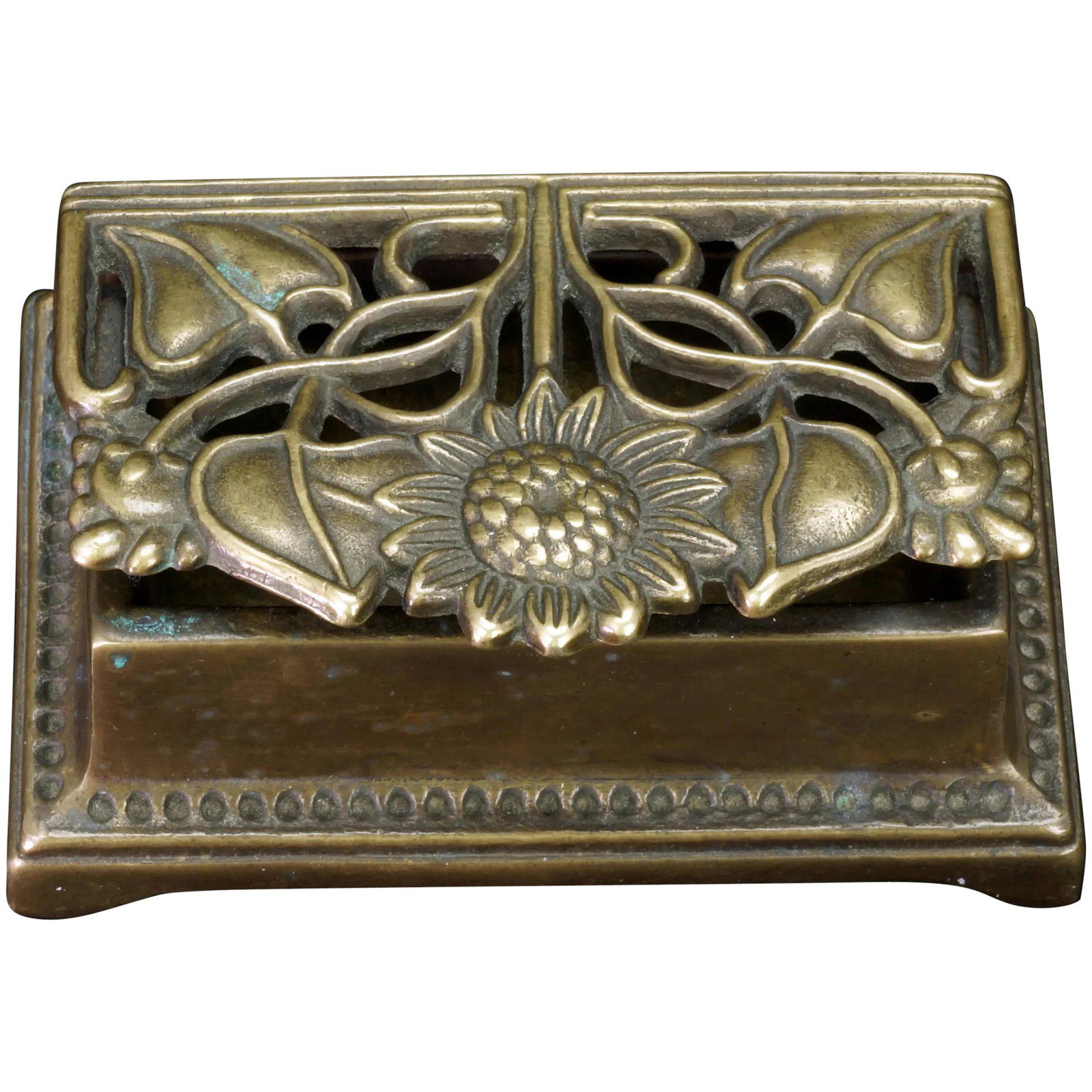 Art Nouveau Bronze Sunflower Stamp Box Circa 1900: Title: Art Nouveau Bronze Sunflower Stamp Box Circa 1900 Size: 3 3/8” (8.4 cm) wide x 2 ½” (6.4 cm) deep x 1 ¼” (3.2 cm) tall. Description: A heavy and well-cast bronze hin