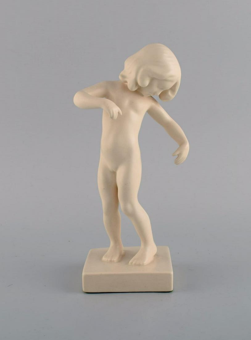 P. Ipsen's, Denmark. Girl no. 888. In rare white glaze. Venus Kalipygos, Design Kai Nielsen. 1940's.: P. Ipsen's, Denmark. Girl no. 888. In rare white glaze. Venus Kalipygos, Design Kai Nielsen. 1940's. Measures: 22,5 x 10,5 cm. In excellent condition. Stamped. Reserve: $280.00 Shipping: Domestic: Shi