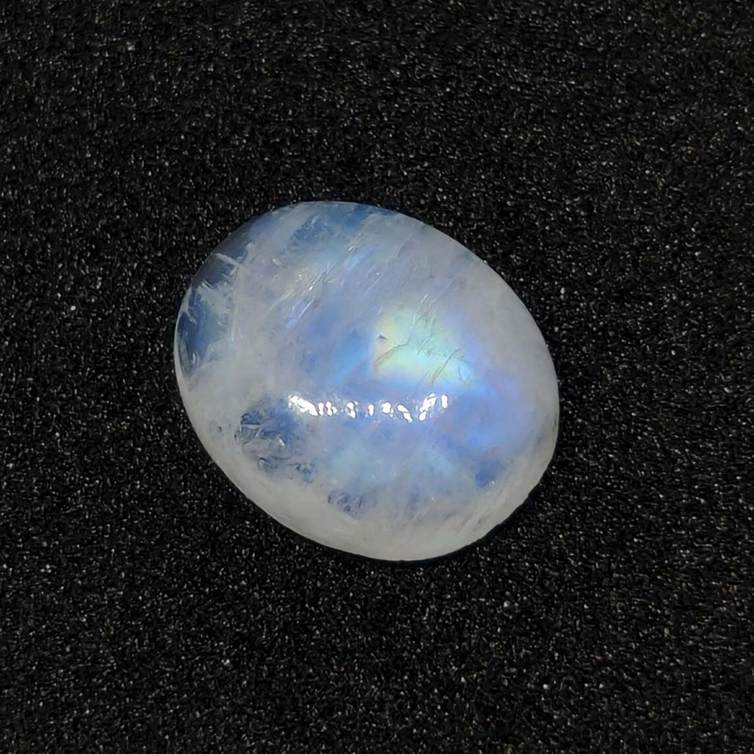 3.85 ct Natural White Rainbow Moonstone: No Reserve! Title: 3.85 ct Natural White Rainbow Moonstone Additional Information: Gemstones: Rainbow Moonstone Carat Weights: 3.85 ct Size/Dimensions:11 X 9 X 4 mm Origin : India Materials & Techniqu