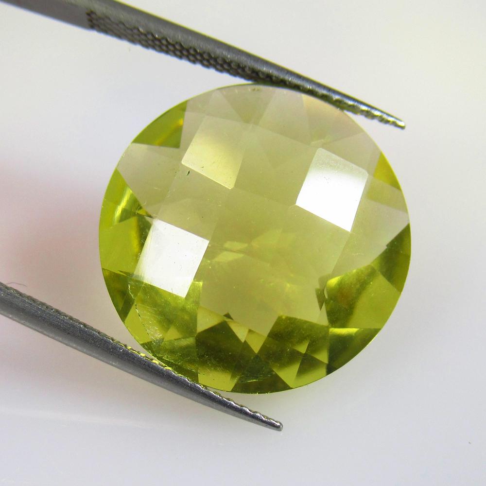 15.01 Ctw Natural Lemon Quartz Round Cut: No Reserve! Title: 15.01 Ctw Natural Lemon Quartz Round Cut Stone Clarity: VVS Gemstones: Natural Lemon Quartz Carat Weights: 15.01 Size/Dimensions: 18.00 x 18.00 x 8.90 mm Additional Information: Top