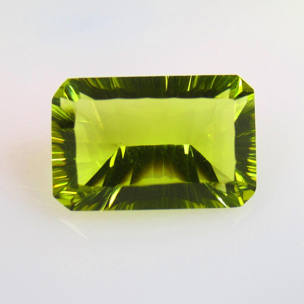 10.16 Ctw Natural Lemon Quartz Concave Cut: No Reserve! Title: 10.16 Ctw Natural Lemon Quartz Concave Cut Stone Clarity: VVS Gemstones: Natural Lemon Quartz Carat Weights: 10.16 Size/Dimensions: 16.90 x 11.10 x 7.70 mm Additional Information: T