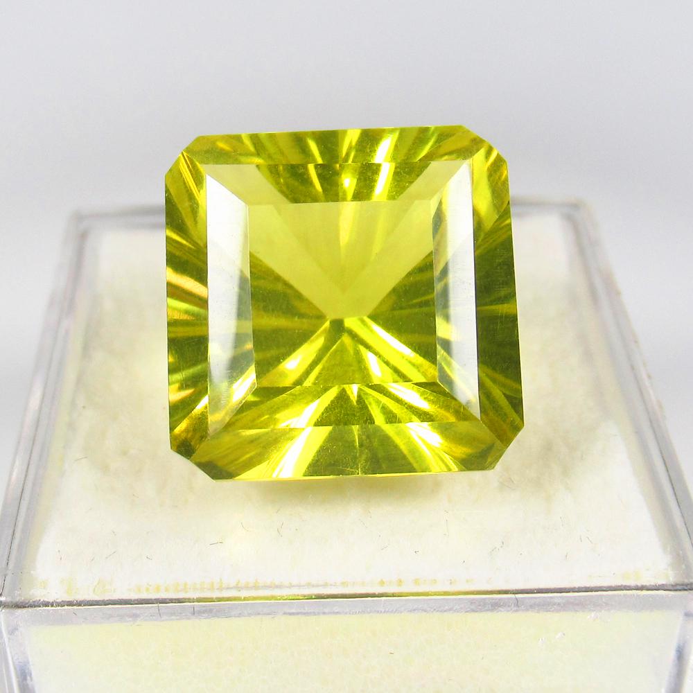 Natural Lemon Quartz - 12.49 Ct: No Reserve! Title: Natural Lemon Quartz - 12.49 Ct Origin: Brazil Weight: 12.49 Size/Dimensions: 14 x 14 x 10 mm Additional Information: Pieces : 1 No's / Shape : Square Octagon Cut / Color : Yellow /