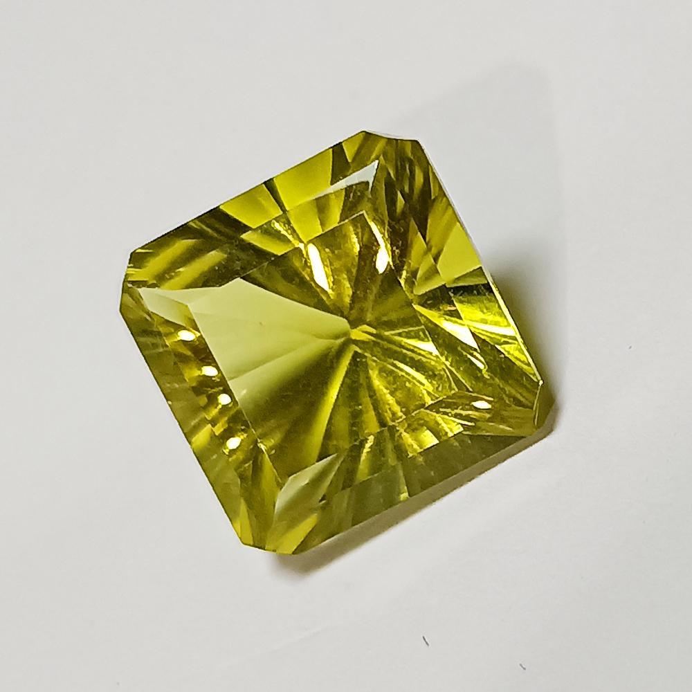 Natural Lemon Quartz - 12.49 Ct: No Reserve! Title: Natural Lemon Quartz - 12.49 Ct Origin: Brazil Weight: 12.49 Size/Dimensions: 14 x 14 x 10 mm Additional Information: Pieces : 1 No's / Shape : Square Octagon Cut / Color : Yellowis