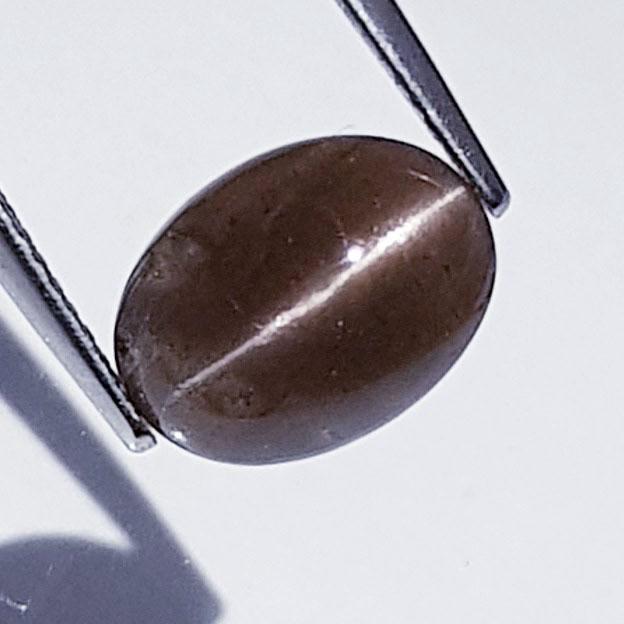 3.86 Ctz Stunning Gem Natural Scapolite Cat's Eye: No Reserve! Title: 3.86 Ctz Stunning Gem Natural Scapolite Cat's Eye Color/Clarity: Brownish Pink / Semi Transparant Carat Weights: 3.86 Size/Dimensions: 11.50 x 8.50 x 5.50 Additional Information: Ov