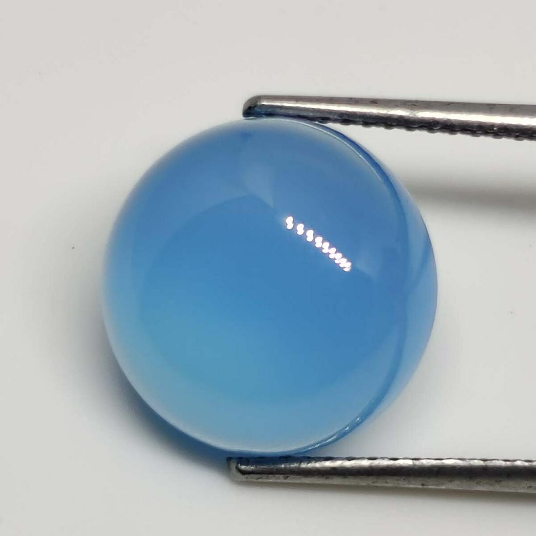 7.45 ct Natural Blue Chalcedony: No Reserve! Title: 7.45 ct Natural Blue Chalcedony Additional Information: Gemstones: Chalcedony Carat Weights: 7.45 ct Size/Dimensions: 12 X 6 mm Materials & Techniques: Chalcedony Shipping: Domestic