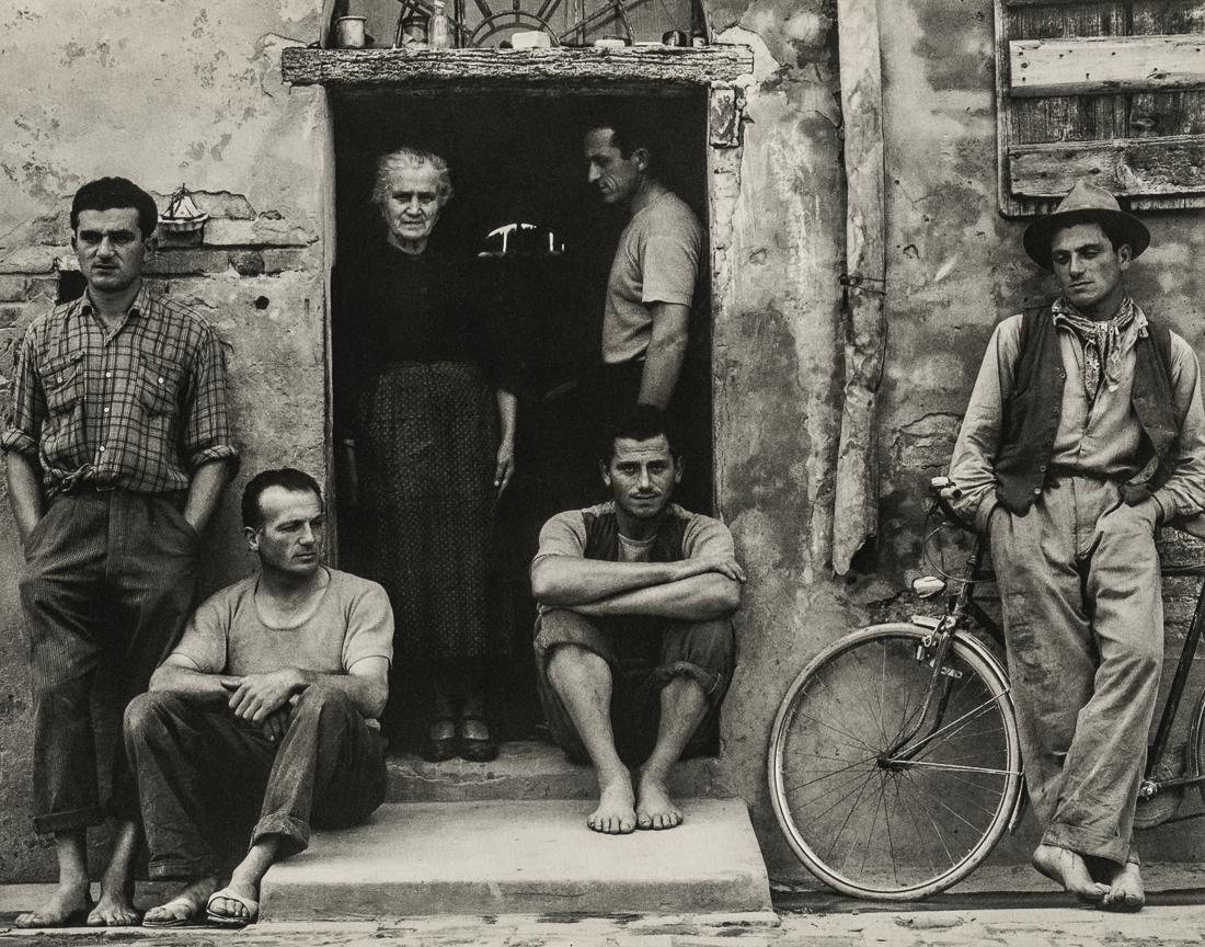 PAUL STRAND - The Family, Luzzara, Italy, 1953: Artist: Paul Strand Title: The Family, Luzzara, Italy, 1953 Medium: Photo Litho, 1976, USA Dimensions: 7x5.5" Description: Heat Wax Mounted on 8.5x11" Conservation Board Artist Bio: Paul Strand (1890