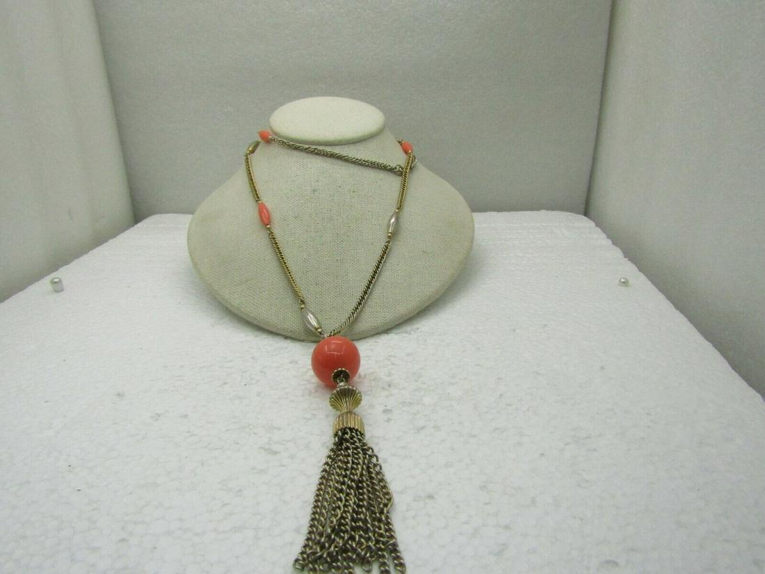 Vintage Orange Beaded Tassel Necklace, 33" , 4" Tassel, Gold Tone, 1960's: Vintage Orange Beaded Tassel Necklace, 33" , 4" Tassel, Gold Tone, 1960's. Large 19.5mm orange lucite bead with oblong ornge beads, gold tone curb link and gold tone oblong beads. 3.5 mm wide curb lin