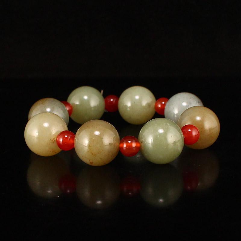 18 MM Chinese Hetian Jade Beads Bracelet: Title: 18 MM Chinese Hetian Jade Beads Bracelet Date Period: After 2000 Origin: Chinese Materials: Hetian Jade Dimensions: 18 (mm) 0.7 (inches) Weight 0.17 lbs/79 g Additional Information: The wooden 