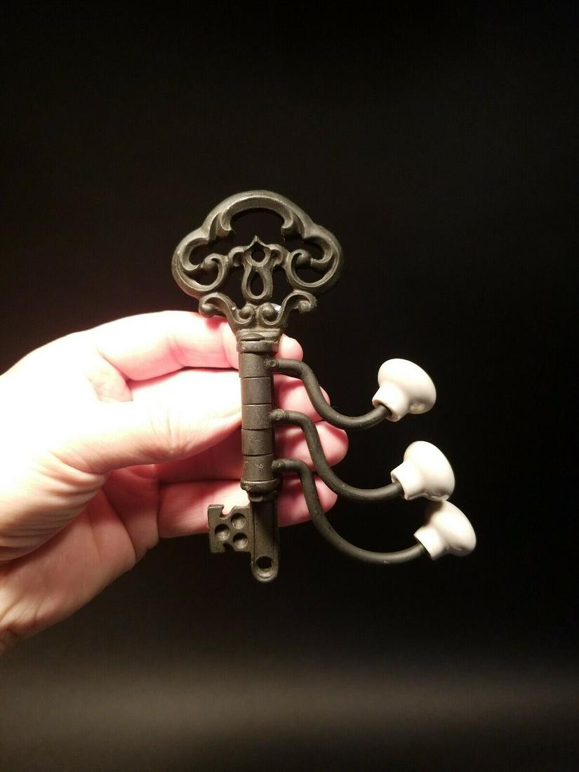 Cast Iron Key Swivel Hook W Porcelain Knobs (1 of 11)