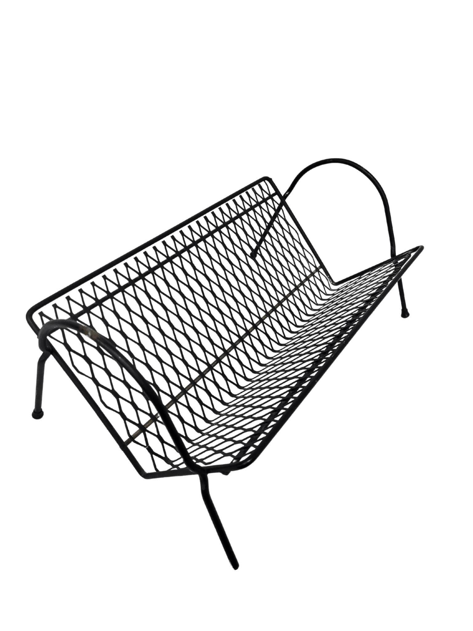 Vintage Mid Century Metal Book Holder, Free Standing Book Holder, MCM Black Mesh Metal Book Stand: Vintage from the 1960s Materials: metal, wire, mesh Description Mid century modern design metal mesh angled book holder. Perfect for your desk or kitchen counter for cookbooks. Also could use on top o
