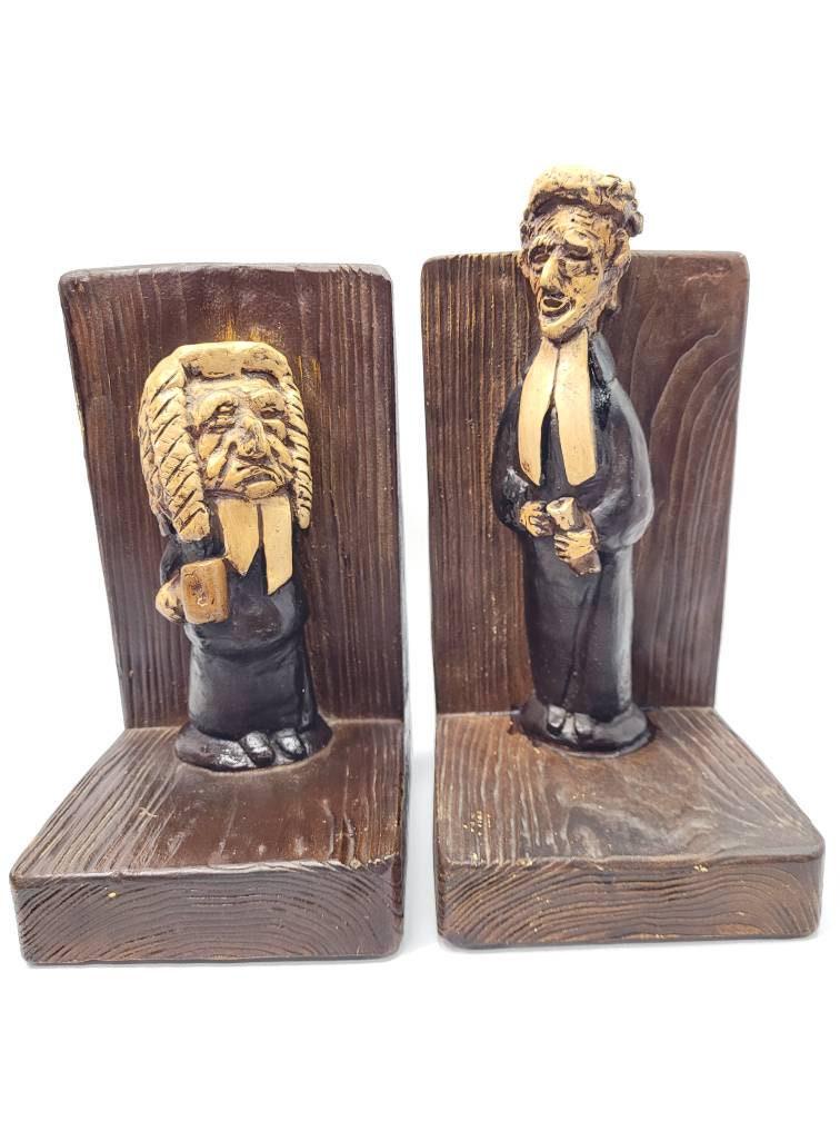 Vintage Folk Art Bookends Faux Wood Scholars Teachers Professors Judge Lawyer Large Heavy Pair Book: Vintage from the 1970s Materials: wood Width: 5.25 inches Height: 10.5 inches Depth: 6 inches Description Vintage Folk Art Bookends Faux Wood Scholars Teachers Professors Judge Lawyer Large Heavy Pair