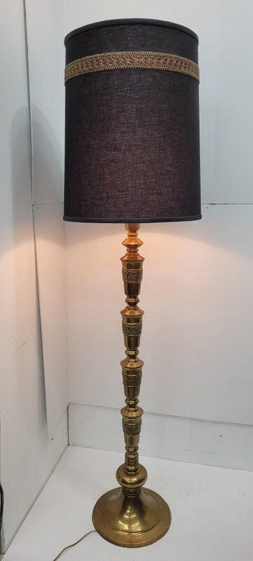 Mid Century Brass Floor Lamp Original Black Shade James Mont Style BOHO Chic Hollywood Regency: Vintage from the 1950s Materials: Fabric, metal Width: 11 inches Height: 63.5 inches Depth: 17 inches Description Mid Century Brass Floor Lamp Original Black Shade James Mont Style BOHO Chic Hollywood