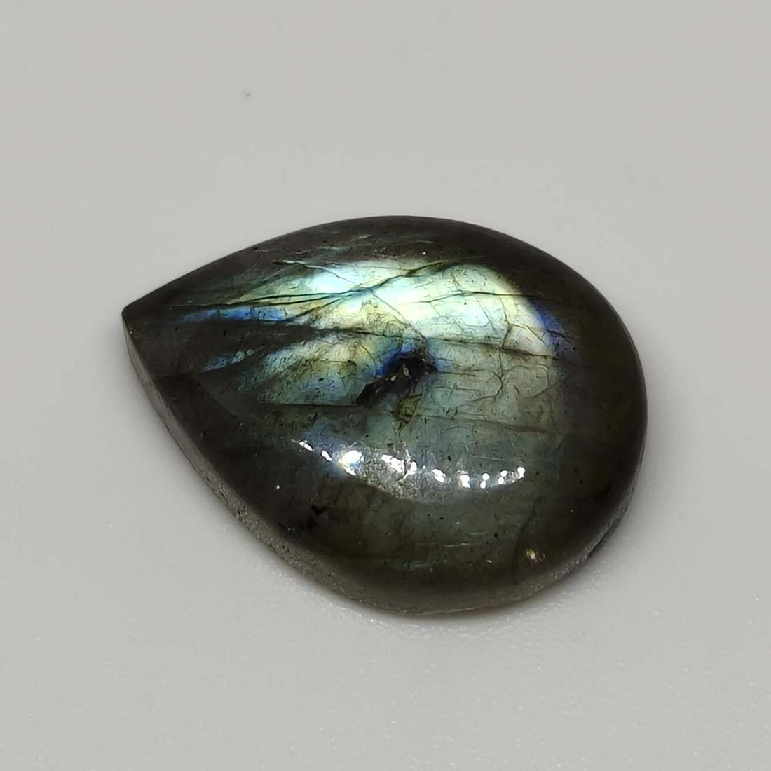 10.80 ct Natural Labradorite: No Reserve! Title: 10.80 ct Natural Labradorite Additional Information: Gemstones: Labradorite Carat Weights: 10.80 ct Size/Dimensions: 18 X 13 X 5.7 mm Origin : Labrador Materials & Techniques: Labra