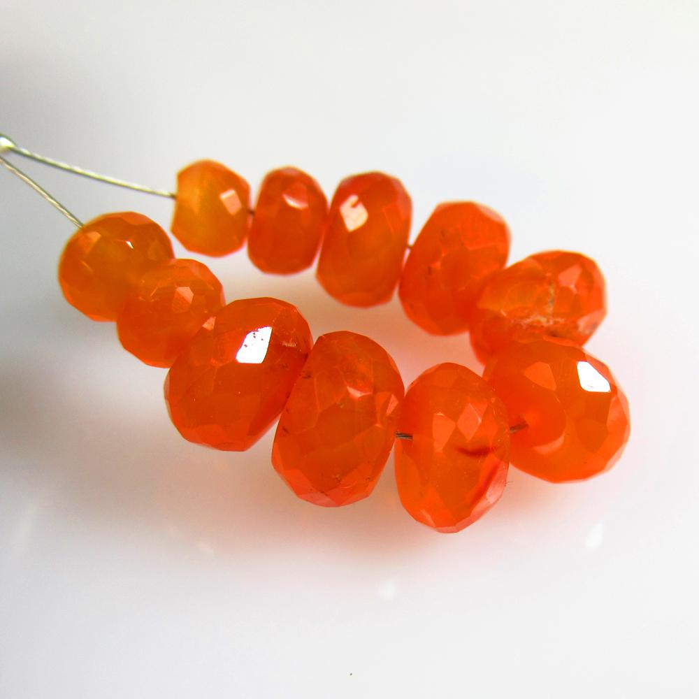 22.43 Ctw Natural 11 Drilled Orange Carnelian Round Beads: No Reserve! Title: 22.43 Ctw Natural 11 Drilled Orange Carnelian Round Beads Stone Clarity: Semi-Transparent Gemstones: Natural Carnelian Beads Carat Weights: 22.43 Size/Dimensions: 6.00 - 8.50 mm / 1