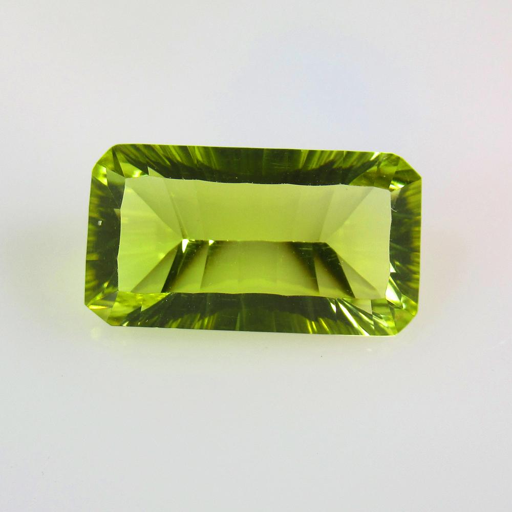 9.26 Ctw Natural Lemon Quartz Concave Cut: No Reserve! Title: 9.26 Ctw Natural Lemon Quartz Concave Cut Stone Clarity: VVS Gemstones: Natural Lemon Quartz Carat Weights: 9.26 Size/Dimensions: 17.90 x 9.90 x 7.30 mm Additional Information: Top 