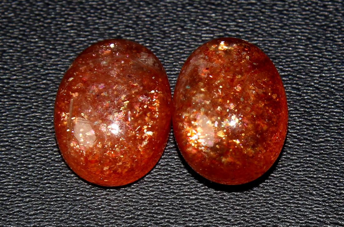 10.20 CtsNatural Sunstone Lot: No Reserve! Title: 10.20 CtsNatural Sunstone Lot Additional Information: Gemstone : Natural Sunstone Origin : Africa Weight : 10.20Carats Dimensions : 12.42x9.64x5.35 mm , 12.52x9.45x5.99 mm Shape : O