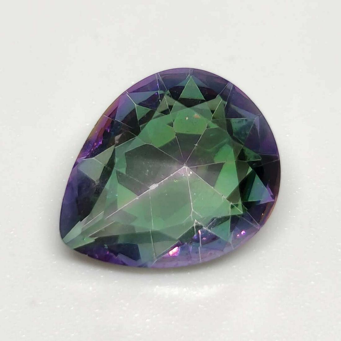 2.55 ct Mystic Quartz: No Reserve! Title: 2.55 ct Mystic Quartz Additional Information: Gemstones: Quartz Carat Weights: 2.55 ct Size/Dimensions: 11 x 8 x 5 mm Treatment: Coated Materials & Techniques: Quartz,Stone Shipping