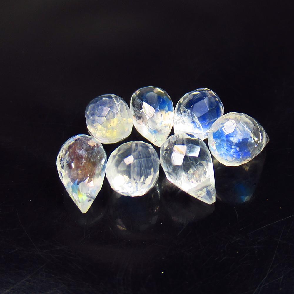 6.07 Ctw Natural 7 Blue Moonstone Pear Drop Beads: No Reserve! Title: 6.07 Ctw Natural 7 Blue Moonstone Pear Drop Beads Stone Clarity: Translucent Gemstones: Natural Moonstone Beads Carat Weights: 6.07 Size/Dimensions: 6.5x4.7- 7.2x4.5 mm / 7 Pc's Add