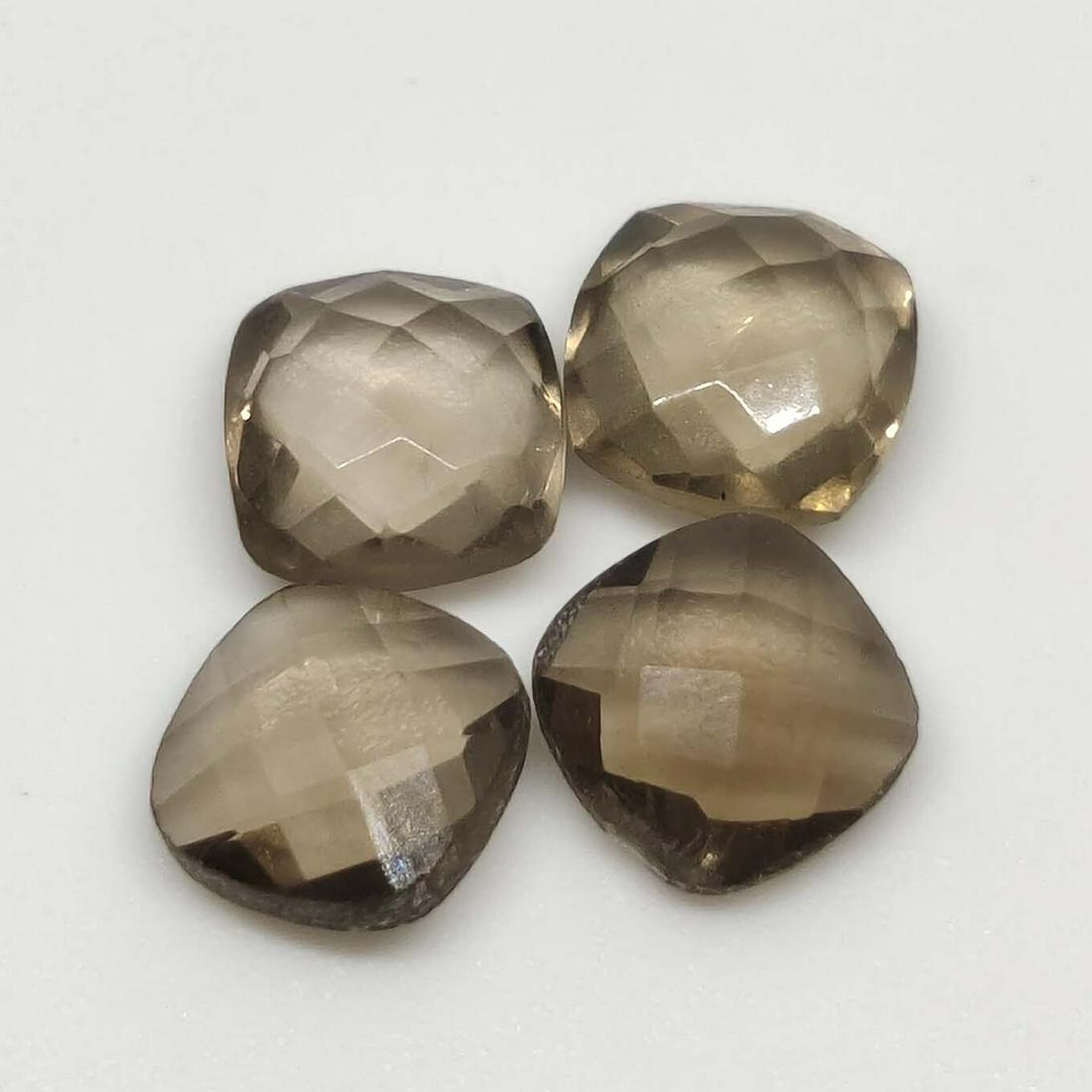 6 ct Natural Smoky Quartz Lot: No Reserve! Title: 6 ct Natural Smoky Quartz Lot Additional Information: Gemstones: Smoky Quartz Carat Weights: 6 ct Size/Dimensions: 7 x 7 X 4 mm Origin : Scotland Materials & Techniques: Quartz Ship