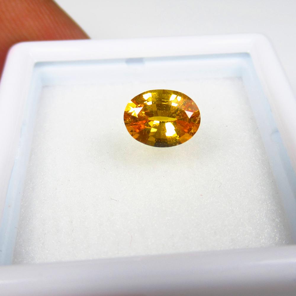 Natural Fancy Orange Sapphire - 0.90 Ct (1 of 2)
