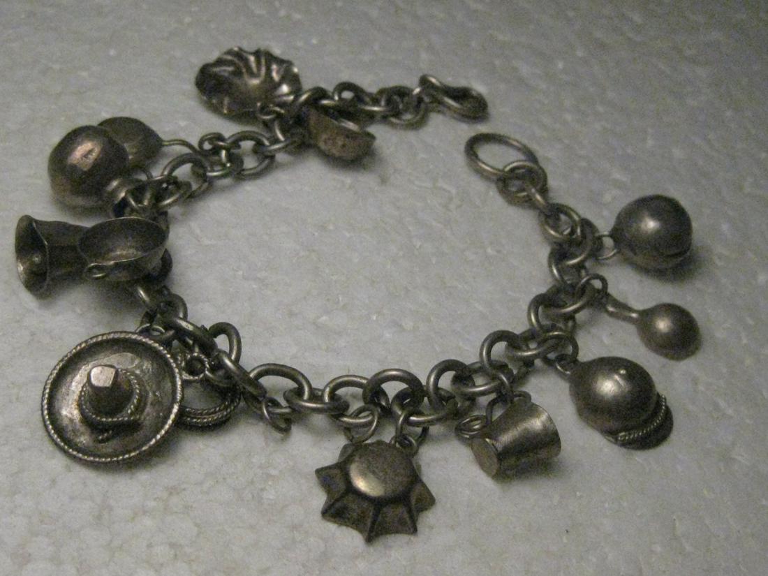 Vintage Silver Cowboy/Tex-Mex Charm Bracelet, 7.5", 13 charms, 1950's, 21.77 gr. (1 of 5)