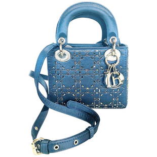 Mini Lady Dior Blue Cannage Satin w/ Rhinestones Handbag: Mini Lady Dior Blue Cannage Satin w/ Rhinestones Handbag Product details: Blue Cannage Satin Narrow adjustable shoulder strap Can be carried in the hand, on the shoulder or across the body Handle bag