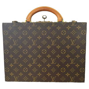 Vintage Louis Vuitton Boite Bijoux Jewelry Travel Trunk Case: LV monogram canvas with leather handle and golden brass hardware - Two storage spaces divided by removable tray with 13 different-sized compartments for jewelry - Brown velvet lining - Lock with the
