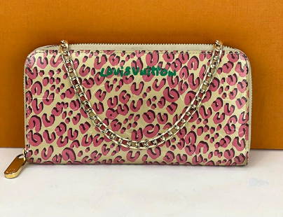 Louis Vuitton Wallet Zippy Stephan Sprouse Vernis Leopard W/Added Chain A935: SKU A935 0222 Pre-Owned 100% Authentic Louis Vuitton Zippy Stephan Sprouse Vernis Leopard W/added chain to carry as crossbody or Use as a Clutch RATING: B...Very Good, Shows some signs of wear