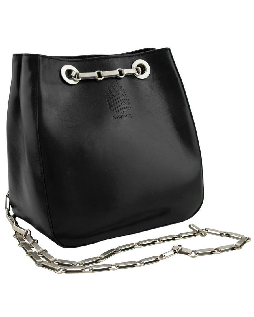 Mark Cross Black Leather Small Bucket Bag: Mark Cross 1990’s black leather small bucket bag with silver flat link double chain handles. Can be worn with the chains doubled on one shoulder or single cross body. Black semi polished leather
