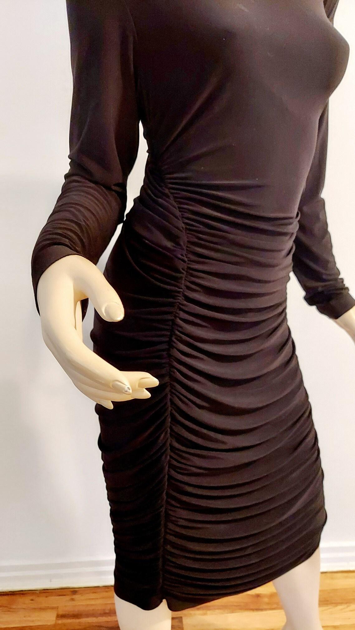 Vtg Runway Norma Kamali Draped Midi Grecian Dress BodyCon: Vintage from the 1980s Materials: Norma kamali, Original, Knit, Lycra, Very Fine Fluid Size: m us women's letter Description This one is an Absolute Classy Stunner By Famous Norma Kamali. Original Dra