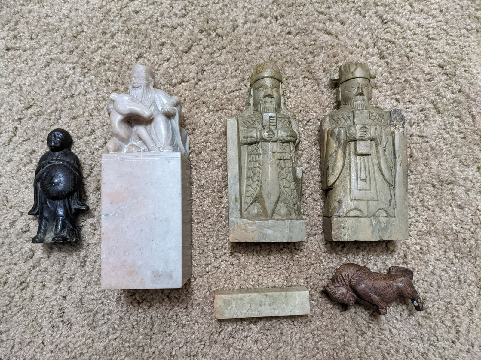 Antique Chinese Japanese stone carved figure/bookends: Title: Antique Chinese Japanese stone carved figure/bookends Date Period: N/A Material: N/A Dimension: N/A Description: Antique Chinese Japanese stone carved figure/bookends Reserve: $100.00 Shipping: