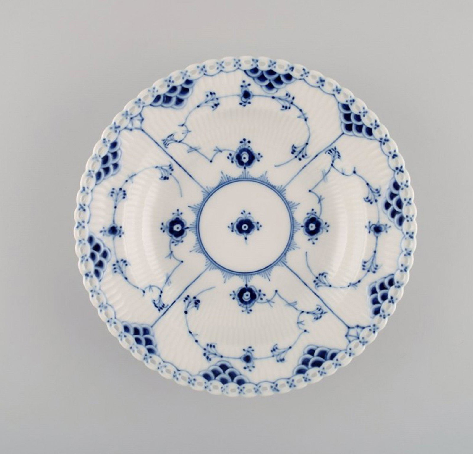 Royal Copenhagen Blue Fluted full lace deep plate. Model number 1/1070.: Royal Copenhagen Blue Fluted full lace deep plate. Model number 1/1070. Measures: 20 x 4 cm. 1st factory quality. In excellent condition. Stamped. Reserve: $60.00 Shipping: Domestic: Shipping rates a