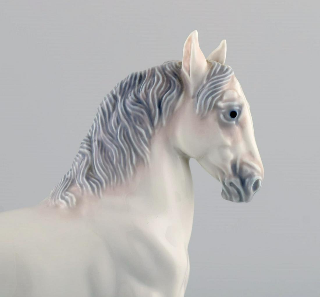 Jeanne Grut for Royal Copenhagen. Rare porcelain figure. Lippizan horse. Dated 1969-1974.: Jeanne Grut for Royal Copenhagen. Rare porcelain figure. Lippizan horse. Dated 1969-1974. Measures: 19 x 16 cm. In excellent condition. Stamped. 1st factory quality. Reserve: $378.00 Shipping: Domesti