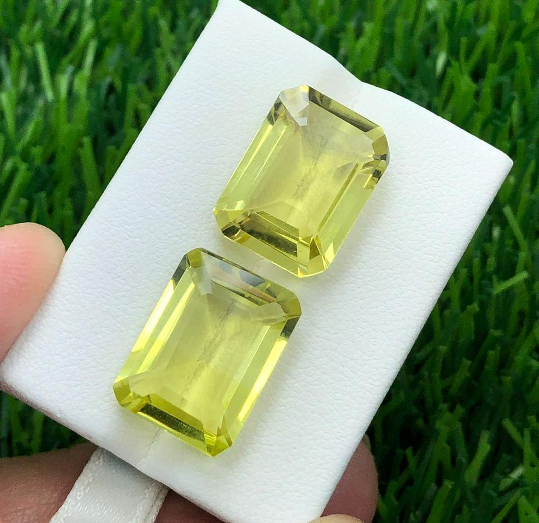 19 Carats Beautiful Lemon Quartz Gemstone: Title: 19 Carats Beautiful Lemon Quartz Gemstone Gemstones: Lemon quartz Carat Weights: 19 Carats Size/Dimensions: 16x12x7mm, 16x12x6mm Additional Information: Natural Reserve: $50.00 Shipping: Domes