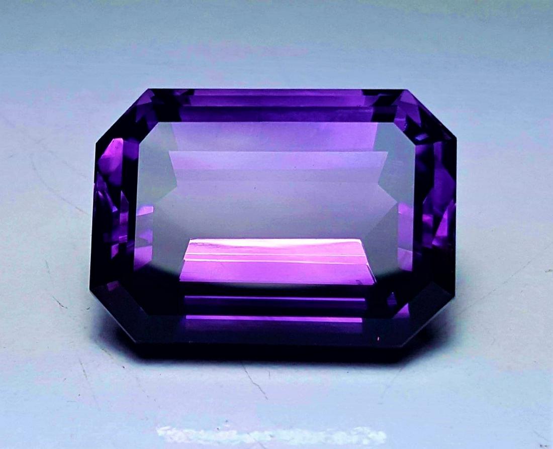 Brazil Amethyst Big Size faceted Gem - 111.55 Carats: Title: Brazil Amethyst Big Size faceted Gem - 111.55 Carats Gemstones: Amethyst Carat Weights: 111.55 Carats Size/Dimensions: 33X24X19 mm Additional Information: Brazil Amethyst Big Size faceted Gem -